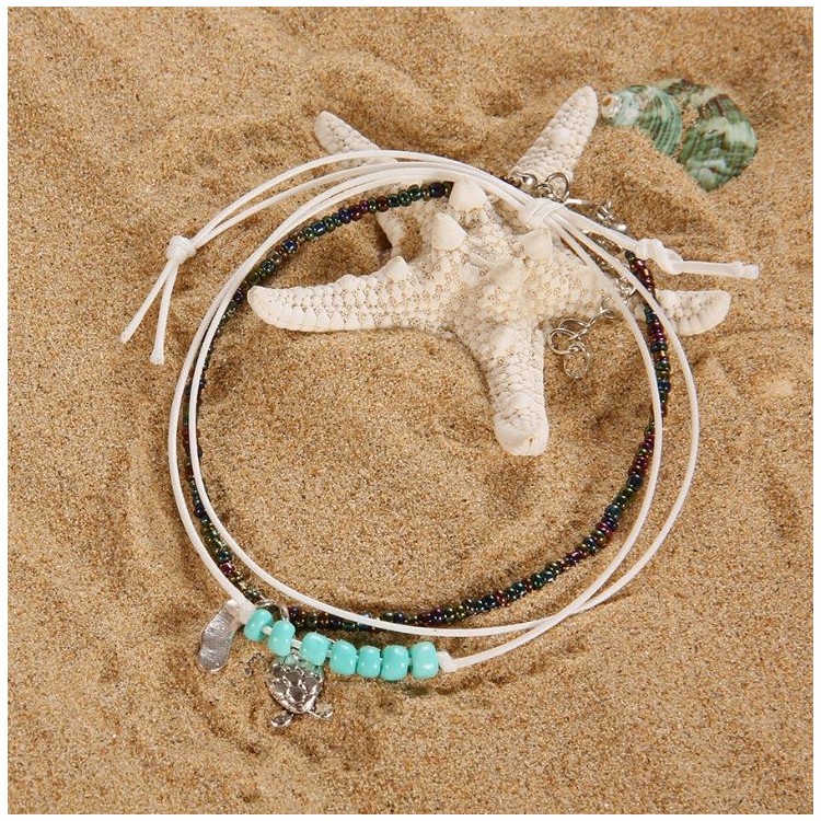 BRANSOLETKA NA NOGĘ KOSTKĘ KORALIKI ŻÓŁWIK B213 - obrazek 3