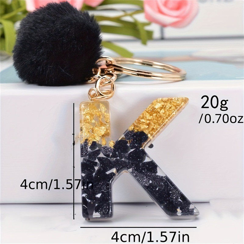 Brelok do kluczy LITERKA "K" czarno-złota z pomponem, żywica BRL342K - obrazek 3